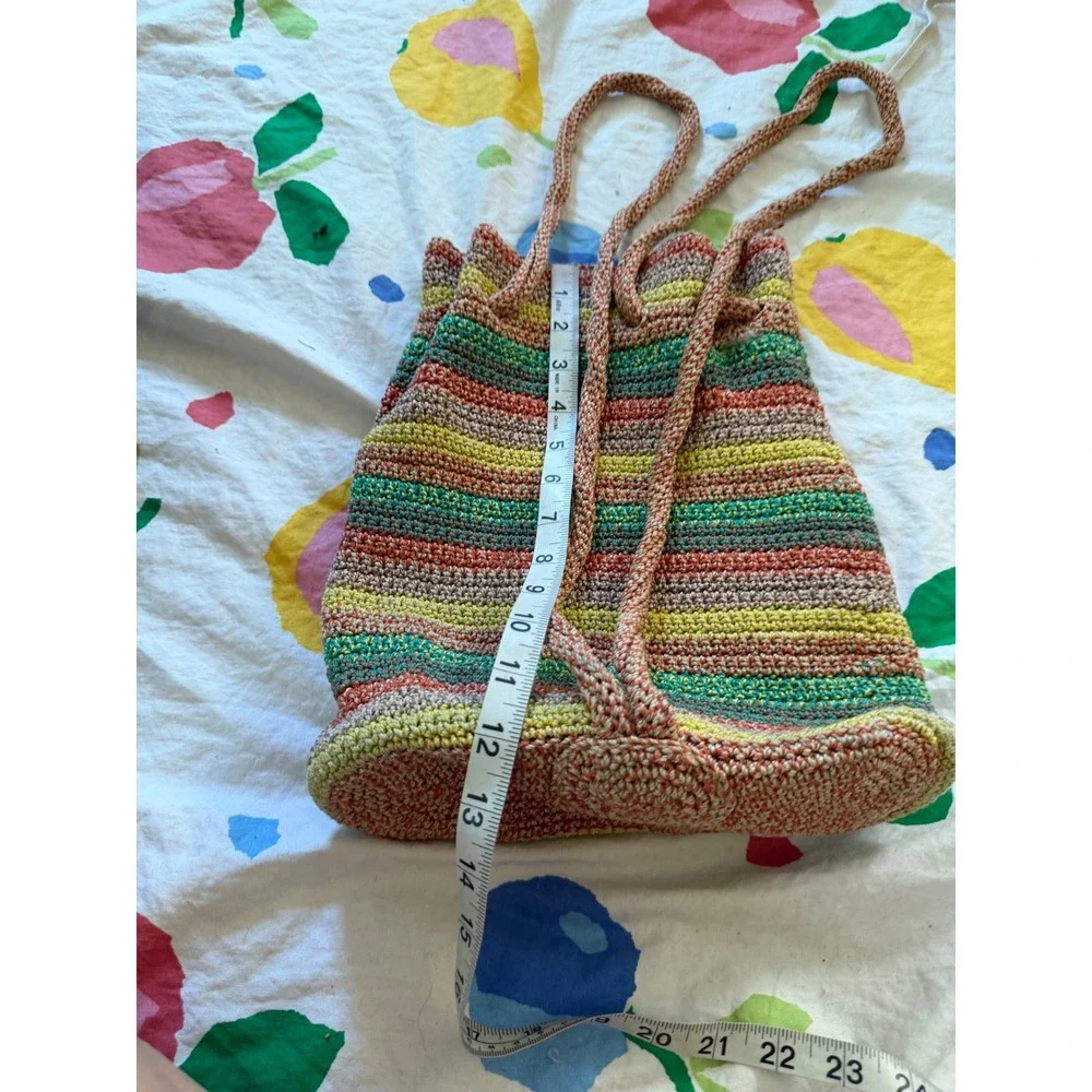 The Sak Crochet Drawstring Backpack Multi Color Striped Boho Bag Handcrafted